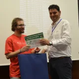 File:Jose María Caballero Alba recibe su diploma en el IX CUSL.JPG