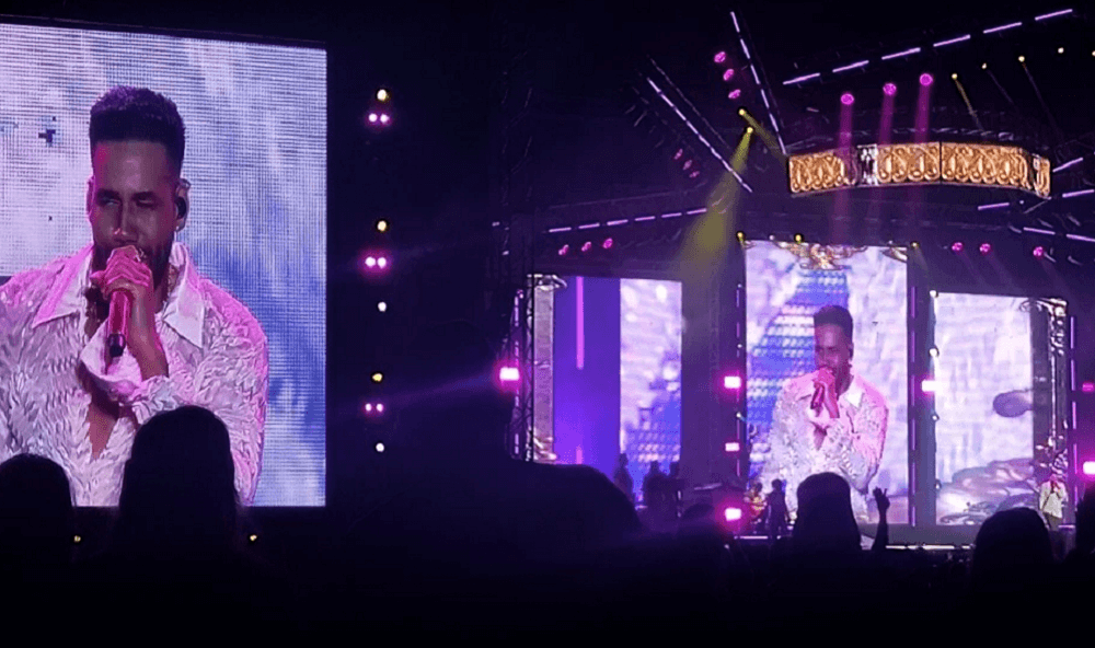 Productora se disculpa por retraso en concierto de Romeo Santos