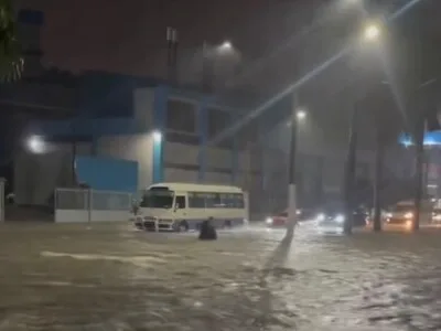 Lluvias anegan calles de Santiago y bloquean vías en Mao