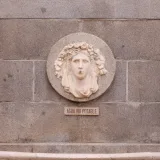 Sculpture with 'Agua No Potable' sign in Madrid, Spain.