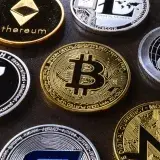 Detailed view of assorted cryptocurrency coins including Bitcoin, Ethereum, and Ripple.