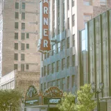 Street view of iconic Warner Theatre in Milwaukee, showcasing urban architecture.