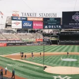 A view of Yankee Stadium's baseball field during the day, capturing the infield and outfield.