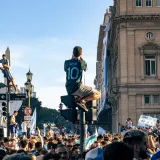 Crowd celebrating in Buenos Aires after Argentina's 2022 World Cup win.