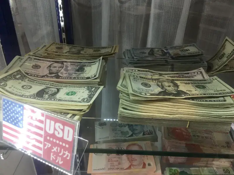 File:American dollar in stacks Tokyo area - Jan 2020.jpeg