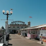 Explore Brighton Palace Pier's charming seaside atmosphere on a sunny day.