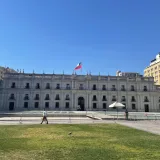 View of La Moneda Palace in Santiago, Chile on a sunny day.