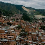 Explore vibrant Comuna 13's urban landscape in Medellín, Colombia from above.