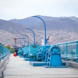 View of an industrial walkway with machinery in El Agustino, Lima, Peru.