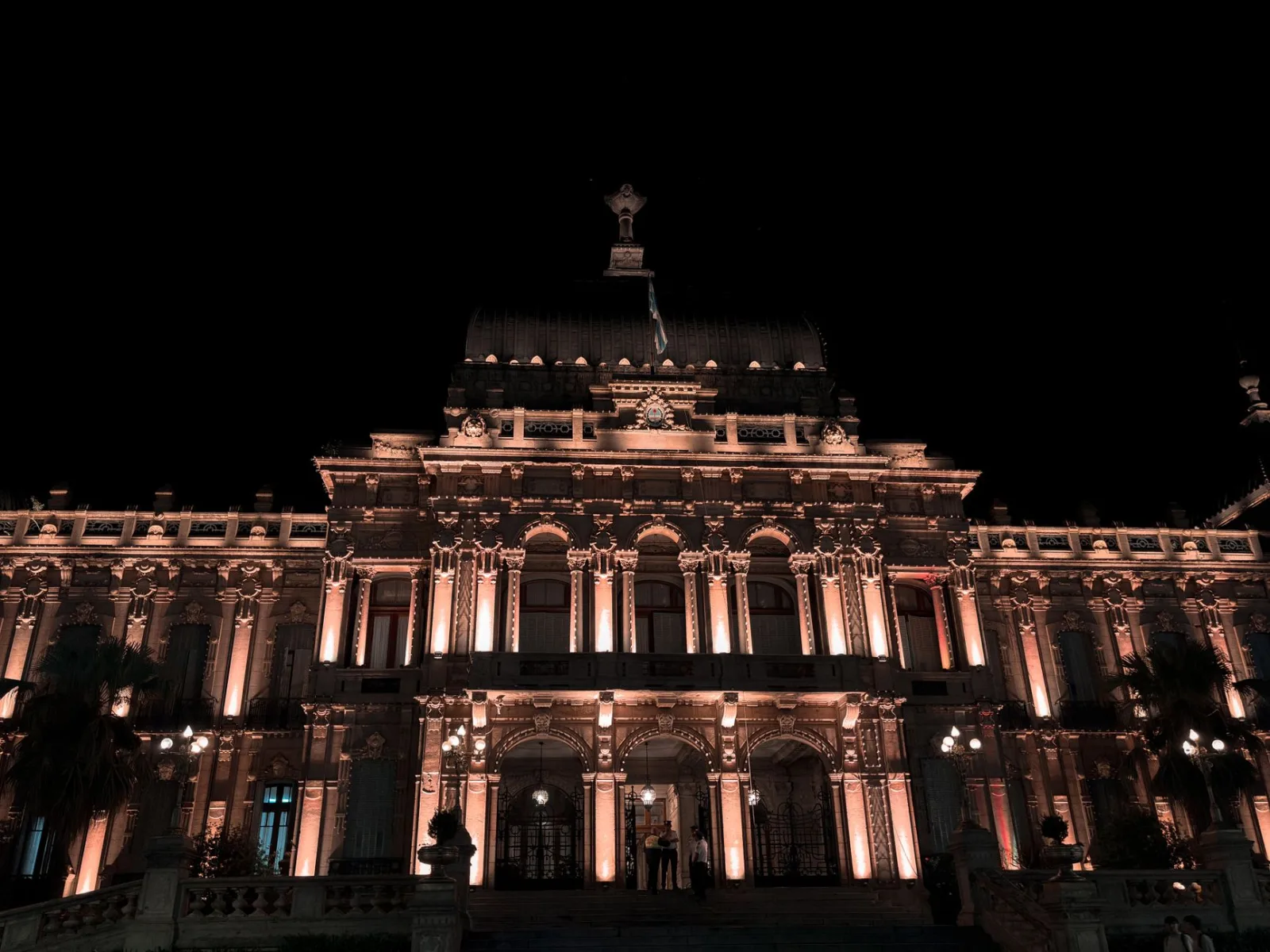 Stunning night view of the Government Palace in San Miguel de Tucumán, Argentina, beautifully illuminated.