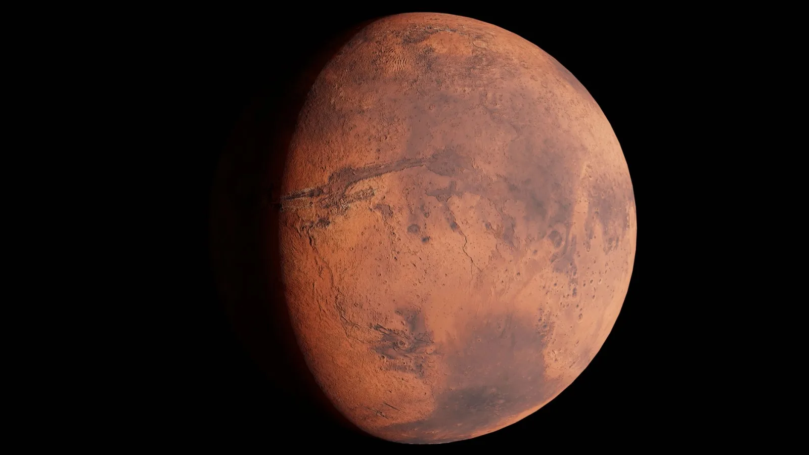 Una imagen de alta resolución que muestra Marte en el espacio, con los detalles de su superficie visibles.