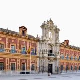 Elegant Baroque facade of Palacio de San Telmo, a historic landmark in Seville, Spain.