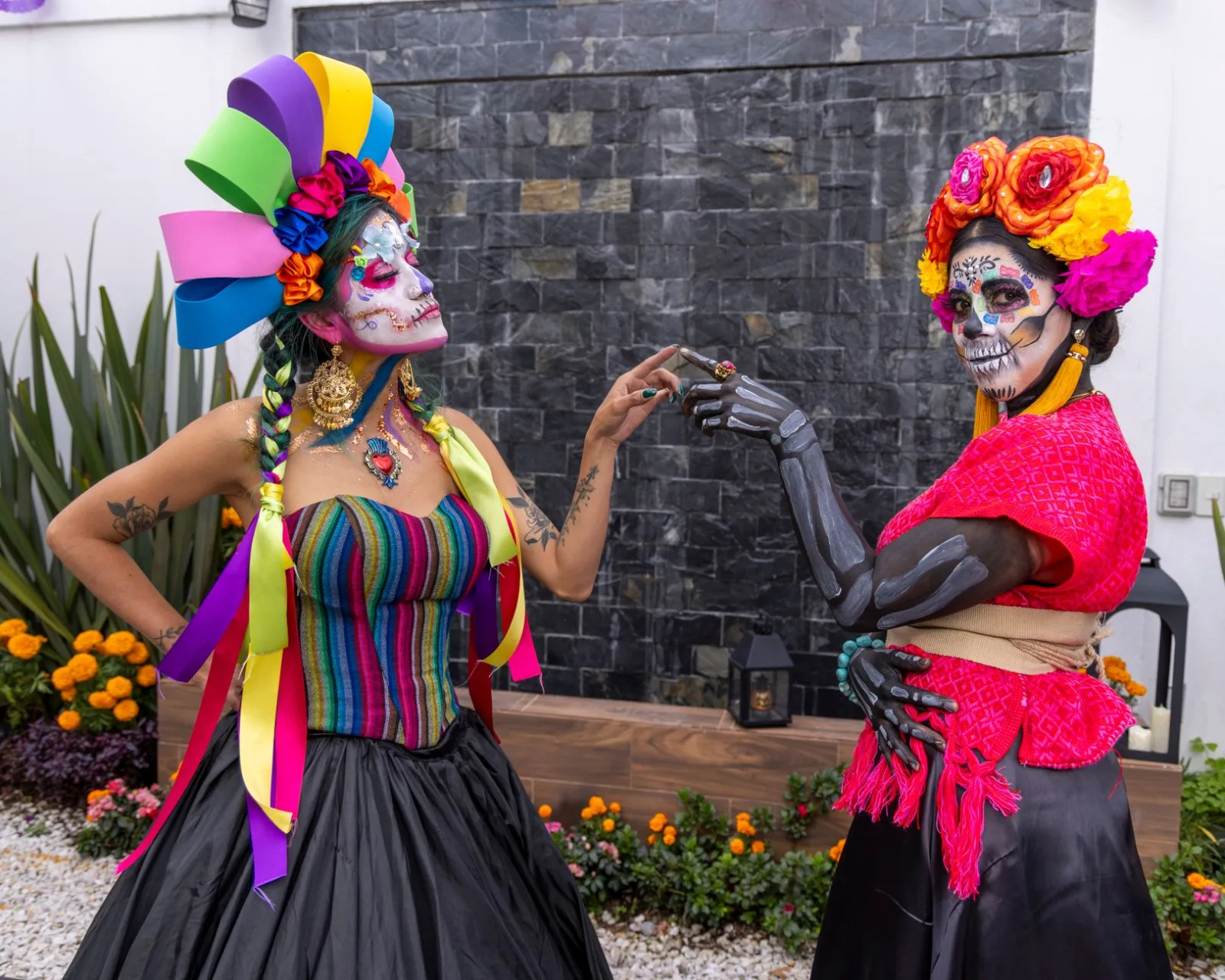 Colorful Día de los Muertos celebration with face paint and traditional Mexican costumes in CDMX.