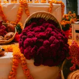 Colorful Day of the Dead altar decorated with marigolds and candles in Chilapa de Álvarez, Mexico.