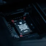 Detailed view of an AMD Ryzen processor securely placed on a motherboard, ideal for tech enthusiasts.