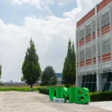 Modern campus building with trees in Lerma de Villada, Mexico.