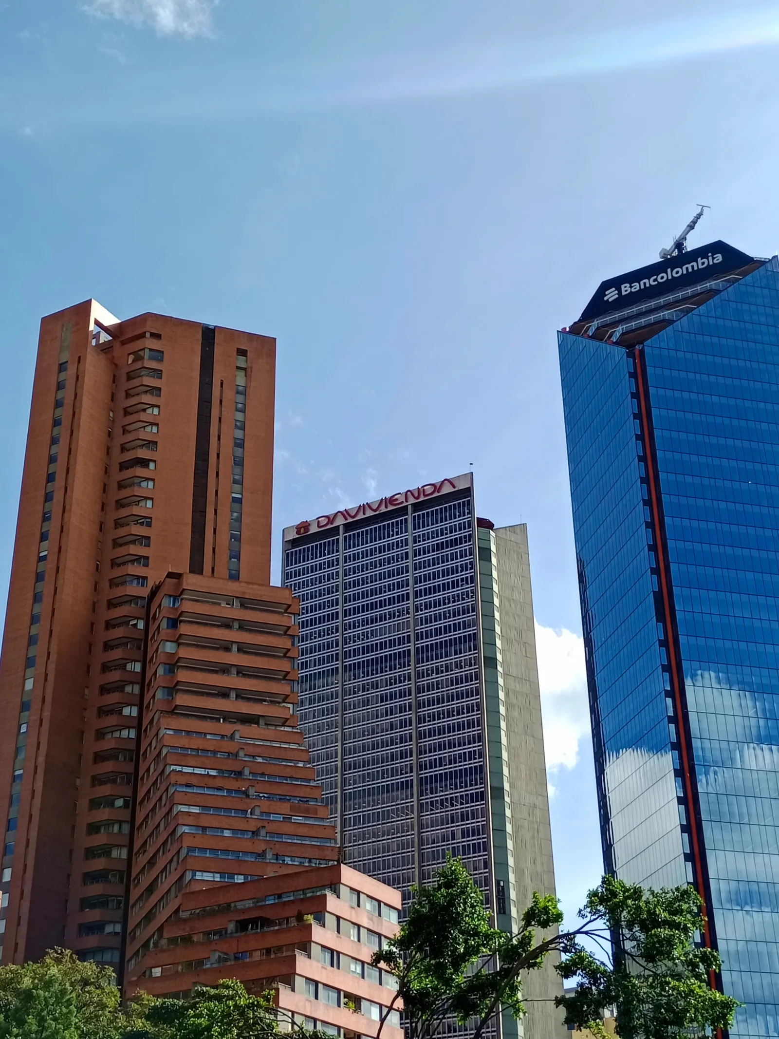 Skyscrapers of Bogotá including iconic Davivienda and Bancolombia buildings.
