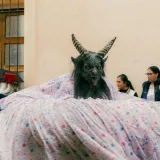 A vibrant traditional parade with unique costumes in San Cristóbal de las Casas, Chiapas, México.