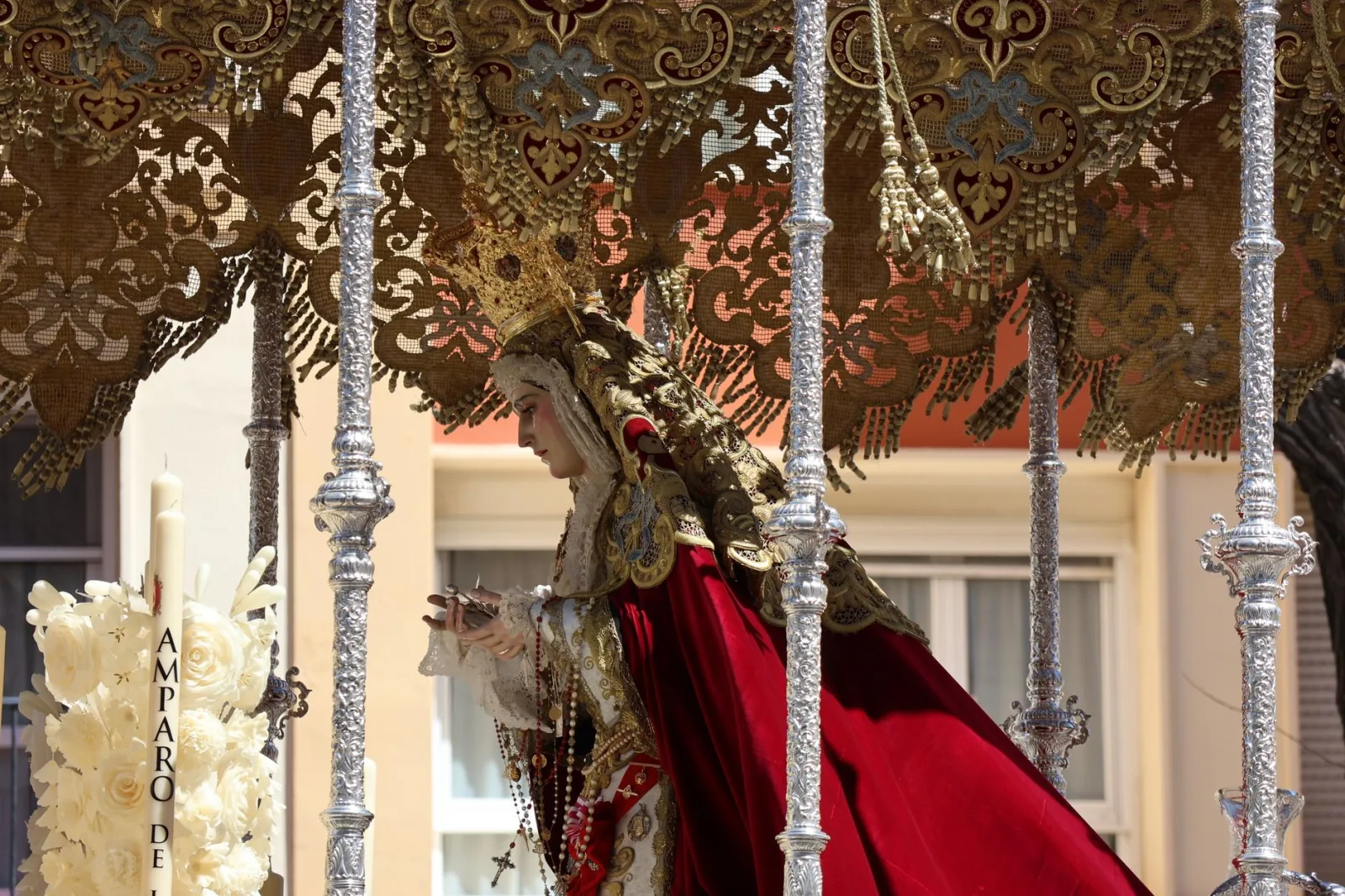 Intricate religious procession during Semana Santa in Cádiz, showcasing traditional Spanish heritage.