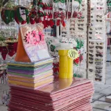 Vibrant market stall in Ciudad de México selling craft supplies and festive decorations.