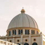Architectural detail of the Teatro Nacional dome in San Salvador, El Salvador at sunset.