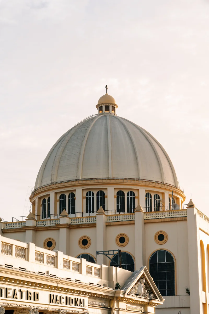 Architectural detail of the Teatro Nacional dome in San Salvador, El Salvador at sunset.