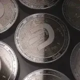 A detailed close-up view of Dash cryptocurrency coins with intricate designs highlighting digital currency.