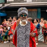 Colorful street festival in Limón, showcasing Afro-Caribbean culture with music and dance.
